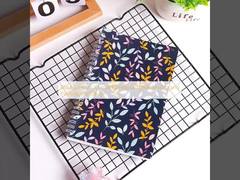 دفتر یادداشت سفارشی مشکی با صحافی فنری و طراحی حرفه‌ای